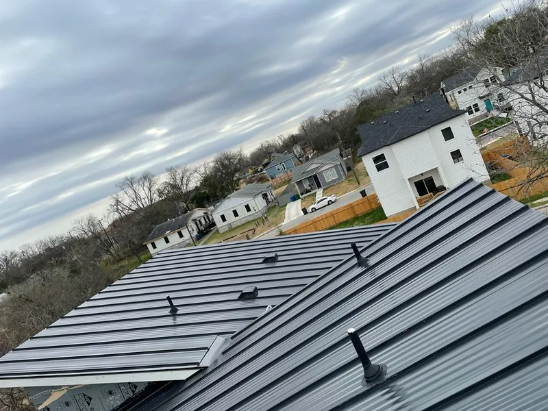 Standing seam metal roof panels with vents for Skylight Repair in Schuyler Falls